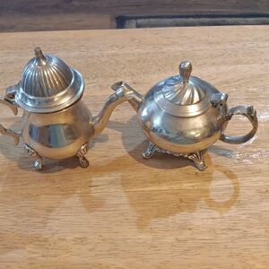 Elegant Silver Tea Pots With Candles